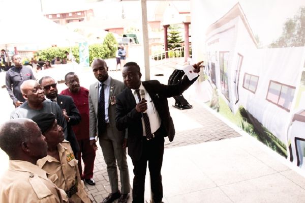 Mr Benjamin Anim, General Manager, Genelec Infrastructure Development Services explain some contents of the project to some veterans. Picture: NII MARTEY M. BOTCHWAY