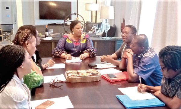  Mrs Rebecca Akufo-Addo (middle), First Lady, in a debriefing session with the Technical advisors of the GAC to OAFLA. On her left is Mr Kyeremeh Atuahene, acting Director General, GAC