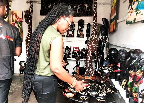  Ms Afua Asabea Asante, Ghana Export Promotion Authority Boss admiring some products on display
