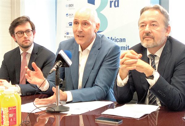 Mr Micahel Blank (middle) addressing the media on GABs in Accra. With him are Mr Christoph Retzlaff (right) and Mr Mark Schow, who both addressed the media.