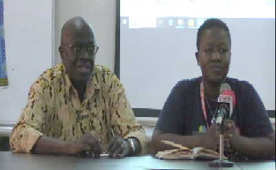 Miss Mercy Annan addressing students of the university. With her is Mr Mamadou L. Diedhoiu  (left), the Dean of Business School, Wisconsin International University