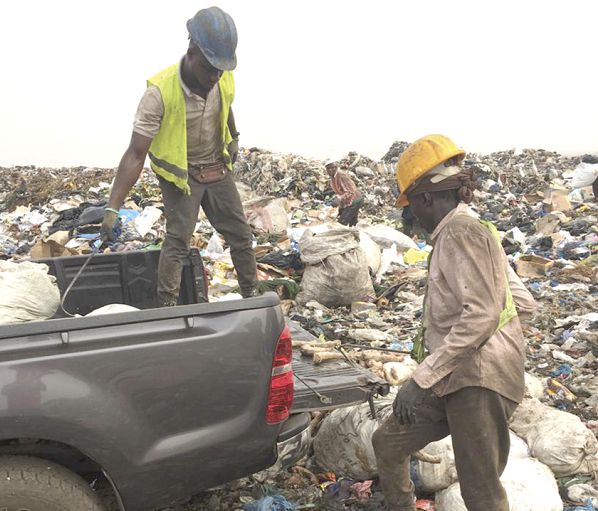 Personnel destroying the seized  items 