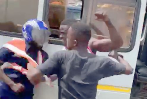 The driver and his mate assaulting the policeman