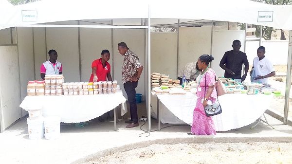 Some participants patronising some local items that were exhibited at the fair