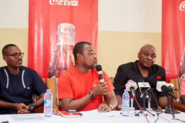 Bethel Yeboah (middle), Public Affairs and Communications Manager of The Coca-Cola Bottling Company of Ghana Limited addressing teachers of Tema West.  Left: Michael Ohene-Effah, Co-Founder of LeadAfrique International and right, Hon Kingsley Carlos Ahenkorah, MP for Tema West
