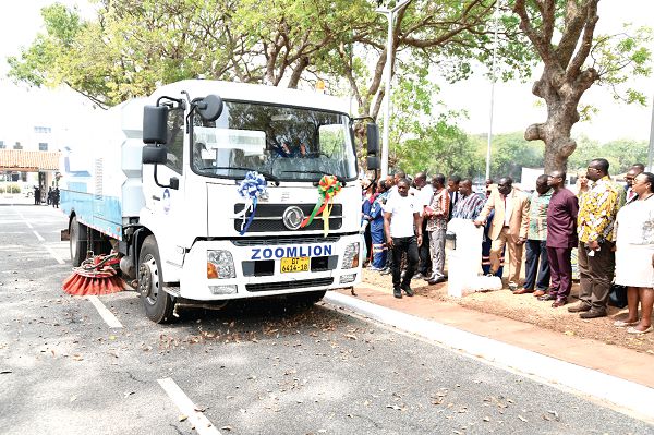 A demonstration by the new mechanical sweepers after the unveiling ceremony. Looking on are Dr Joseph Siaw Agyepong (3rd right), Executive Chairman of Jospong Group of Companies and some dignitaries. Picture: EBOW HANSON  