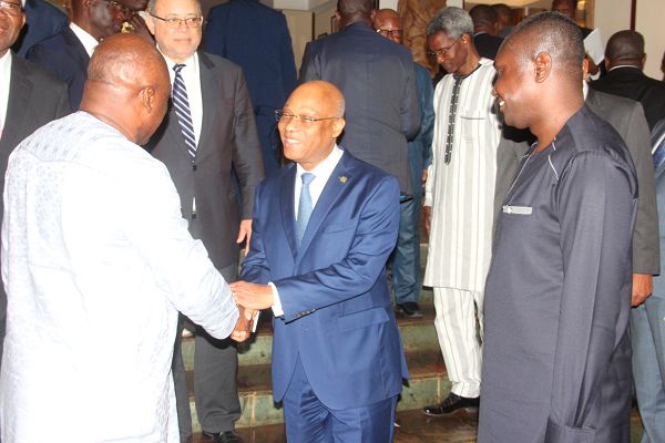  Mr Carlos Kingsley Ahenkorah (left), a Deputy Minister of Trade and Industry, in a handclasp with Mr Jean-Claude Kassi Brou (2nd left), President of the ECOWAS Commission. Looking on is Mr Charles Owiredu (right) a Deputy Minister of Foreign Affairs and Regional Integration. Picture: Maxwell Ocloo