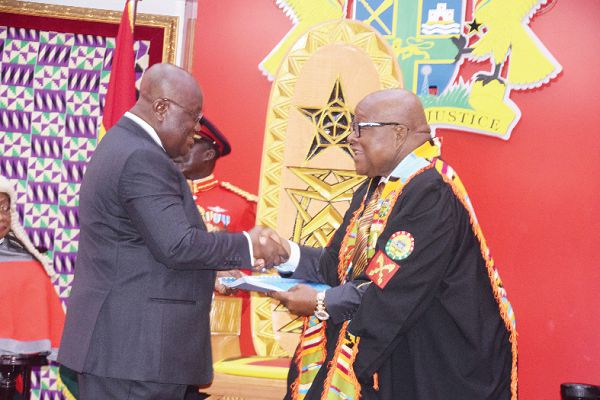  President Akufo-Addo presenting a copy of the speech to the Speaker of Parliament, Prof. Mike Aaron Oquaye. Picture: SAMUEL TEI ADANO