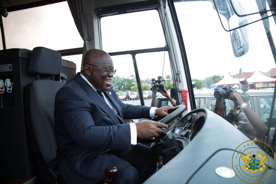 President Akufo-Addo behind the wheels of one of the Ankai buses