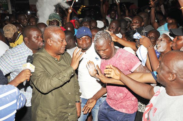 Former President John Mahama responding to cheers from some NDC supporters. Picture: EBOW HANSON