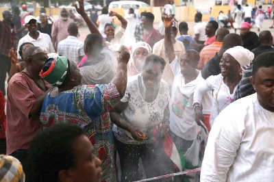 Jubilant supporters of the NDC at the party headquarters in Accra