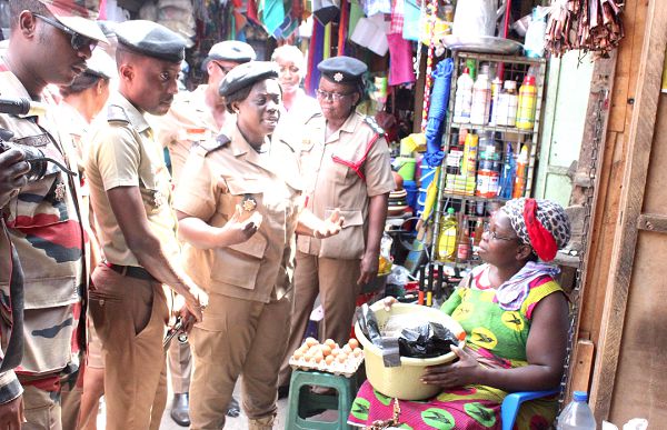 Mrs Naomi Ofori-Adubea, DO II, District Commander, Ministries fire station,interacting with traders at Tema station in Accra on fire safety. Picture: INNOCENT K.OWUSU.
