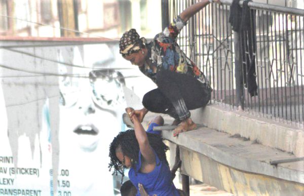 The victims being rescued from the three-storey apartment at Asafo in Kumasi. Picture: EMMANUEL BAAH 