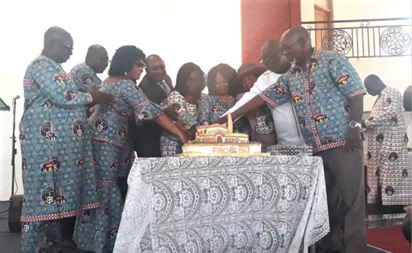 Some congregants of the Tema First Baptist Church cutting the 50th anniversary cake
