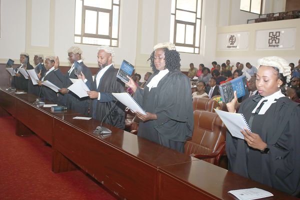  Ms Justice Sophia A.B Akuffo (left), the Chief Justice, swearing the new circuit court judges into office. Picture: GABRIEL AHIABOR