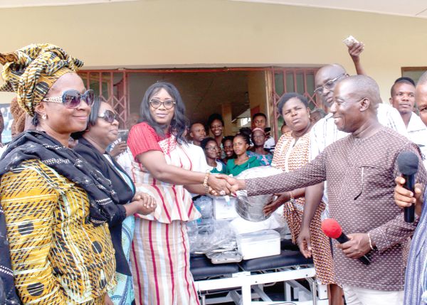 Mr Thomas Moore Zonyrah, DCE, Central Tongu District Assembly, expressing his appreciation to Mrs Cynthia Morrison for the items