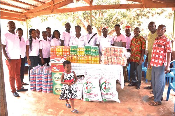 Officials of the Women’s World Banking Ghana (WWBG) and the Christ Faith Foster Home after the donation