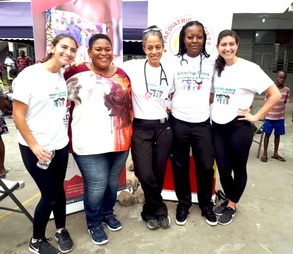 The Amazing Grace Children's Foundation members with some volunteers