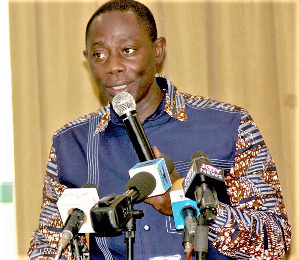 Mr Ishmael Agyekumhene (right) speaking at the public hearing on tarrif adjustment yesterday