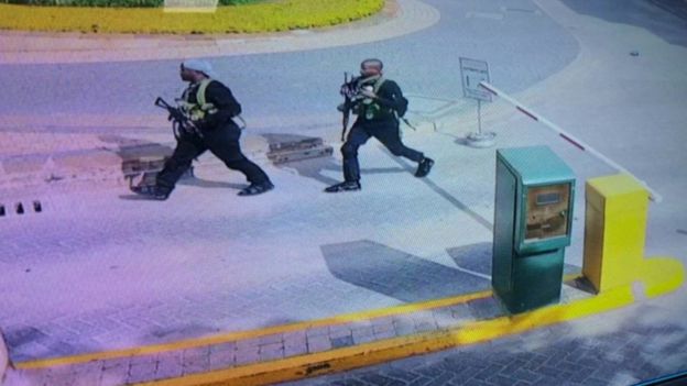  The attackers, two of which are shown here, were caught on CCTV as they entered the complex 