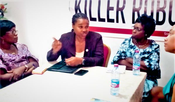  Dr Ayoo Ayoola-Amale (middle) speaking at the event.