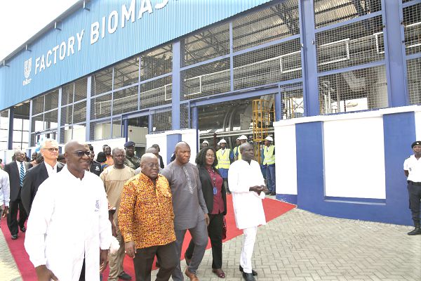 President Nana Addo Dankwa Akufo-Addo (2nd left) being conducted round the factory by Mr Nazaire Djako (left), the Supply Chain Director of the company. Pictures: SAMUEL TEI ADANO