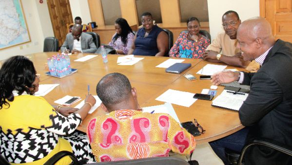 Mr Ato Afful (right) holding discussions with the delegation at his office in Accra. Picture: EDNA ADU-SERWAA