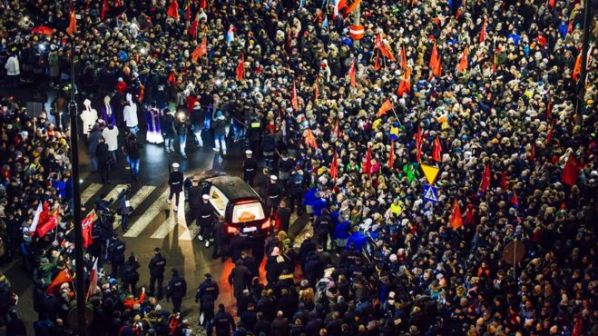 Large crowds followed Mr Adamowicz's coffin through the streets on Friday