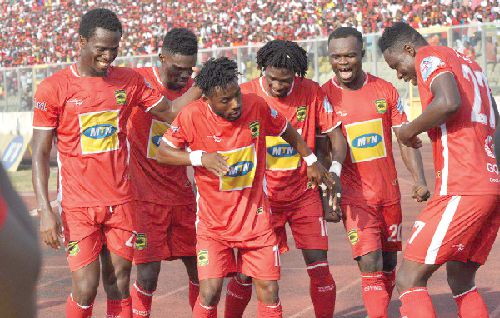 Kumasi Asante Kotoko players celebrating their second goal in yesterday’s game
