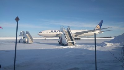 Passengers stuck on flight in frigid cold for over 14 hours
