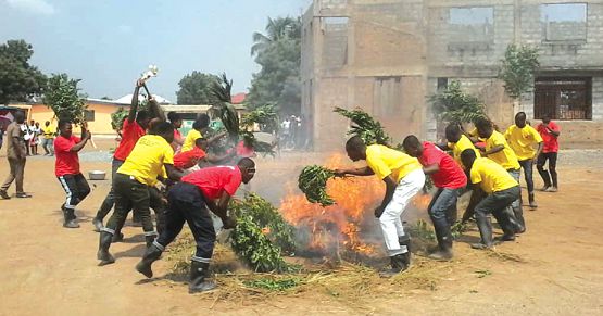 Some of the fire volunteers demonstrating the skills and knowledge gained during the training