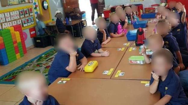 White and black schoolchildren were seated apart from each other at the school in Schweizer-Reneke