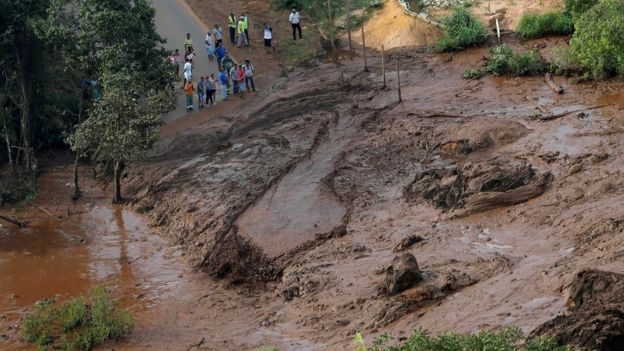 Roads have been destroyed by the sludge, complicating rescue efforts