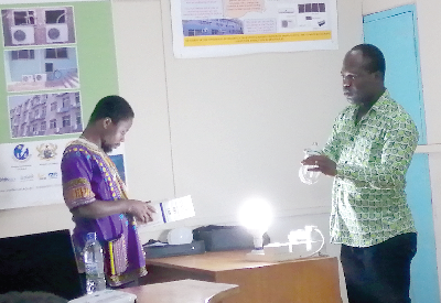 Dr Richard Opoku taking a participant through a demonstration