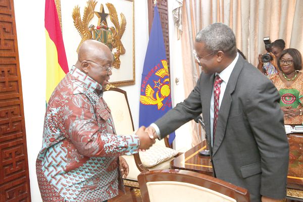 President Nana Addo Dankwa Akufo-Addo (left) welcoming Prof. Elijah Paintsil to his office. Picture: SAMUEL TEI ADANO 