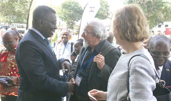 Prof Kwabena Frimpong-Boateng (left),   interacting with Prof Sir Tom Blundell (2nd left), of the University of Cambridge, UK. Looking on is Dr Ozlem Ergun Ulueren (right), the Turkish Ambassador to Ghana. Picture: Maxwell Ocloo