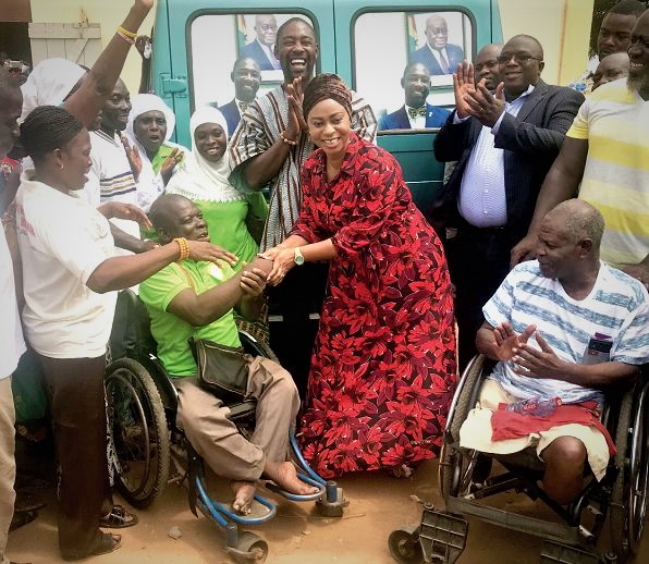Sarah Adwoa Sarfo, MP for Dome-Kwabenya, presenting the keys on behalf of Dr Okoe Boye, to Mr Joe Mends, President of More Hope for the Disabled Foundation.