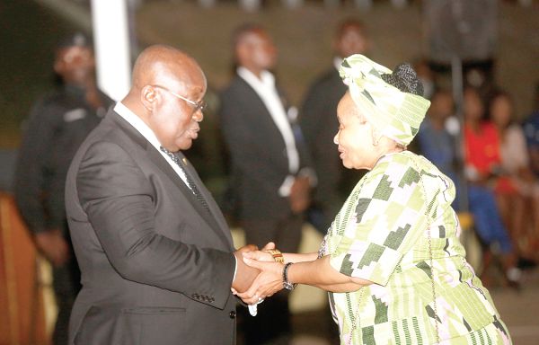 President Nana Addo Dankwa  Akufo-Addo shaking hands with Madam Lulu Xingwana (right), the South African High Commissioner at the ceremony at the Jubilee House in Accra. Picture:  Samuel Tei Adano