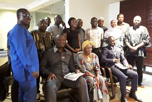 The Health Committee Members and officials of the coalition in a group photo after their meeting in Accra.
