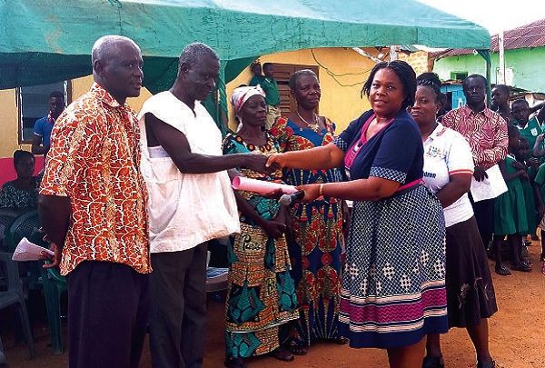 Mrs Beatric Essilfie presenting educational materials on reproductive health to the team of role models