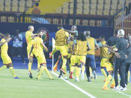 Players of Benin burst into wild celebration after their stunning victory