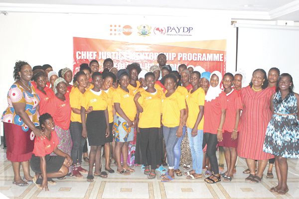 Mrs Aku Xornam Kevi (left), Executive Director, Purim African Youth Development Platform and Dr Doris M. Aglobitse (2nd right), Programme Analyst, UNFPA, with beneficiaries of the Chief Justice Mentoring Programme. Picture: Maxwell Ocloo