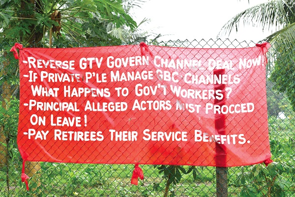 A banner mounted at the entrance of the GBC Headquarters  mounted by some of its workers