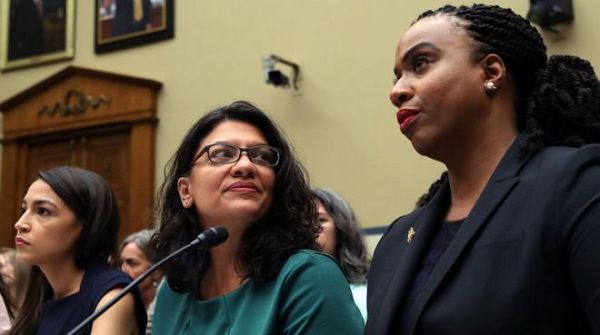 Alexandria Ocasio-Cortez (left), Rashida Tlaib (centre) and Ayanna Pressley (right)