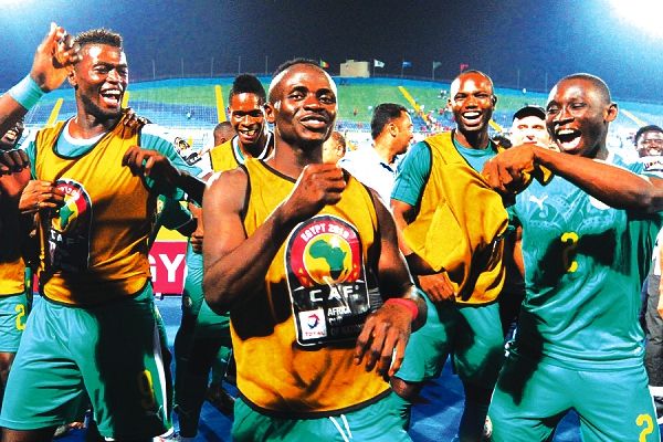 Senegal’s posterboy, Sadio Mane, leads his teammates to celebrate their victory over Tunisia yesterday