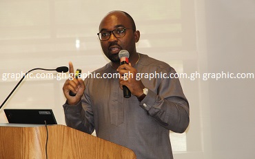 Dr Albert Touna Mama, Resident Representative of the International  Monetary Fund (IMF) in Ghana, addressing  the workshop in Accra. Picture: ESTHER ADJEI