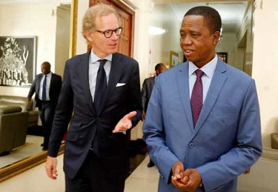 President Edgar Chagwa Lungu (right) speaks with Swedish Ambassador to Zambia Henrik Cederin