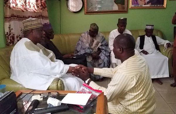Sidii Abubakar (right) in a handshake with the Chief of Madina,Alhaji Baba Seidu during his Courtesy call