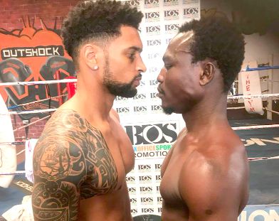  Face to face: Freddy Kiwitt (left) meets Samuel Turkson at yesterday’s weigh-in 