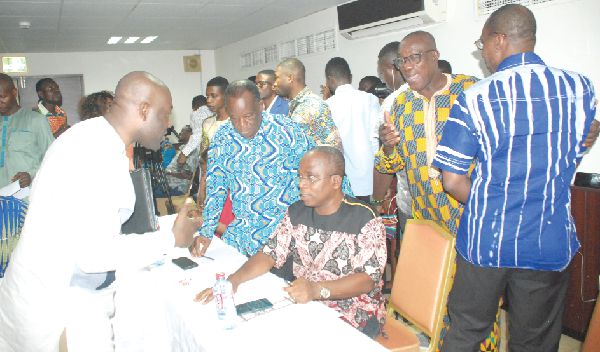  Mr Kojo Oppong Nkrumah (left) interacting with Mr Yaw  Boadu-Ayeboafoh at the  stakeholders’ engagement on the mechanism on safe and responsible journalism in Accra